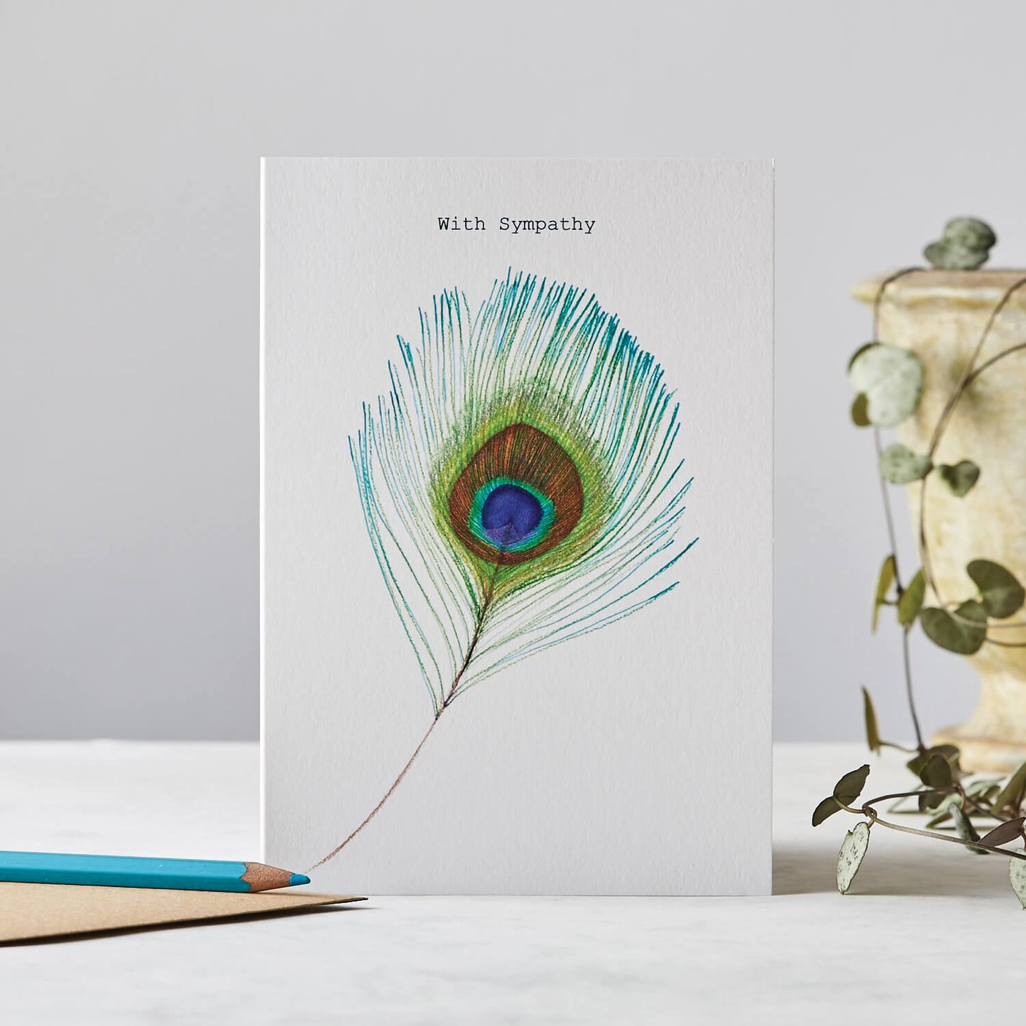 WITH SYMPATHY PEACOCK FEATHER CARD